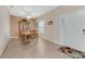 Charming dining room featuring a wooden table and built-in hutch at 323 Mariners Gate Dr, Edgewater, FL 32141