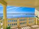 Balcony overlooks the water and bridge with a pelican statue at 3606 S Peninsula Dr # 809, Port Orange, FL 32127