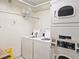 Shared laundry room with several coin-operated washer and dryers at 3606 S Peninsula Dr # 809, Port Orange, FL 32127