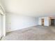 Bright and airy living room with neutral carpeting at 3606 S Peninsula Dr # 809, Port Orange, FL 32127