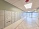 Building mailboxes in a well-lit hallway with tiled floors at 3606 S Peninsula Dr # 809, Port Orange, FL 32127