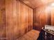 Simple storage area with wooden walls and a bench at 3606 S Peninsula Dr # 809, Port Orange, FL 32127