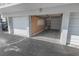 Empty garage with shelving and open door at 3641 S Atlantic Ave # 221, Daytona Beach, FL 32118