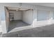 Private garage with shelving for storage at 3641 S Atlantic Ave # 221, Daytona Beach, FL 32118