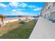 Ground-level patio with firepit and picnic tables near the beach at 3641 S Atlantic Ave # 221, Daytona Beach, FL 32118