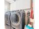 Bright laundry room with modern washer and dryer at 3862 Cardinal Blvd, Port Orange, FL 32127