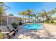 Inviting kidney-shaped pool with brick patio at 3862 Cardinal Blvd, Port Orange, FL 32127