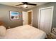 Light and airy bedroom with a queen bed and closet at 402 Lincoln Ave, New Smyrna Beach, FL 32169