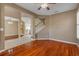 Living room area showcasing staircase and open-concept floor plan at 454 Venetian Villa Dr, New Smyrna Beach, FL 32168