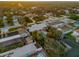 Aerial view showcasing a home with a pool and neighboring houses at 4611 Doris Dr, New Smyrna Beach, FL 32169