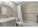 Updated bathroom with a vanity, toilet and bathtub at 4611 Doris Dr, New Smyrna Beach, FL 32169