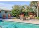 Relaxing poolside patio furniture near the pool at 4611 Doris Dr, New Smyrna Beach, FL 32169