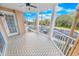 Outdoor balcony with tile flooring and ceiling fan at 4623 Rivers Edge Village Ln # 6204, Ponce Inlet, FL 32127