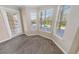 Bedroom with window views and access to a private balcony at 4623 Rivers Edge Village Ln # 6204, Ponce Inlet, FL 32127