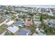 Aerial view of a residential area close to the beach, complemented by mature trees and serene surroundings at 4650 Saxon Dr, New Smyrna Beach, FL 32169