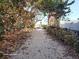 Path to the beach with a yellow bicycle parked nearby at 4650 Saxon Dr, New Smyrna Beach, FL 32169