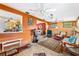 Cozy living room with tile flooring and natural light at 4650 Saxon Dr, New Smyrna Beach, FL 32169