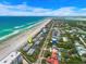 Aerial view of beachfront property, highlighting its oceanfront location and proximity to the beach at 4773 S Atlantic Ave # 10, Ponce Inlet, FL 32127