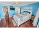 Well-appointed bedroom with hardwood floors at 4773 S Atlantic Ave # 10, Ponce Inlet, FL 32127