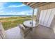 Oceanfront patio with table and chairs, offering ocean view at 4773 S Atlantic Ave # 10, Ponce Inlet, FL 32127