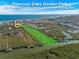 Aerial view showing river access with canoe launch and fishing pier at 50 Pompano Dr, Ponce Inlet, FL 32127