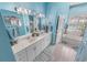 Double vanity bathroom with a bathtub and shower at 50 Pompano Dr, Ponce Inlet, FL 32127