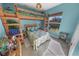 Bedroom with a bunk bed and wicker furniture at 50 Pompano Dr, Ponce Inlet, FL 32127