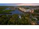 Elevated view of waterfront home, showcasing its location and surroundings at 504 N Riverside Dr, New Smyrna Beach, FL 32168