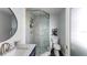 Modern bathroom with walk-in shower and stylish vanity at 504 N Riverside Dr, New Smyrna Beach, FL 32168