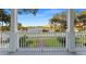 White porch overlooking the waterfront with a view of the water at 504 N Riverside Dr, New Smyrna Beach, FL 32168