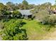 Aerial view showing home's landscaped backyard and location within a quiet community at 507 Boxwood Ln, New Smyrna Beach, FL 32168