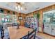 Wood-paneled dining room with built-in bar and unique decor at 507 Boxwood Ln, New Smyrna Beach, FL 32168