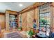 Unique entryway with wood-paneled walls and built-in shelving at 507 Boxwood Ln, New Smyrna Beach, FL 32168