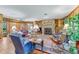 Cozy living room featuring a fireplace and hardwood floors at 507 Boxwood Ln, New Smyrna Beach, FL 32168