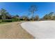 Golf course sand trap with rake at 507 Boxwood Ln, New Smyrna Beach, FL 32168