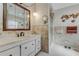 Large bathroom with double sinks and a walk-in shower at 51 Club House Blvd, New Smyrna Beach, FL 32168