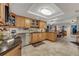 Modern kitchen with stainless steel appliances and light wood cabinets at 51 Club House Blvd, New Smyrna Beach, FL 32168