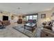 Spacious living area with leather sofas and a coffee table at 51 Club House Blvd, New Smyrna Beach, FL 32168