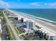 Aerial view showing beachfront location and amenities at 5207 S Atlantic Ave # 626, New Smyrna Beach, FL 32169