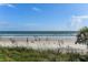 Scenic beachfront view with dunes and ocean at 5207 S Atlantic Ave # 626, New Smyrna Beach, FL 32169