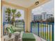 Relaxing balcony with seating and scenic views at 5300 S Atlantic Ave # 15-201, New Smyrna Beach, FL 32169