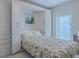 Bedroom with a murphy bed and lots of storage at 5300 S Atlantic Ave # 15-201, New Smyrna Beach, FL 32169