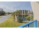 Peaceful waterfront view with pond and lush landscaping at 5300 S Atlantic Ave # 15-201, New Smyrna Beach, FL 32169