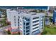 An aerial shot showcasing the top of a multi-story beachfront building with scenic ocean views at 5300 S Atlantic Ave # 3-504, New Smyrna Beach, FL 32169