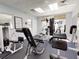 Well-equipped gym featuring modern exercise machines and fitness equipment in a bright space at 5300 S Atlantic Ave # 3-504, New Smyrna Beach, FL 32169