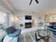 Modern living room showcasing bright light, comfortable seating, and stylish decor at 5300 S Atlantic Ave # 3-504, New Smyrna Beach, FL 32169
