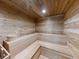 Relaxing cedar sauna with bench seating at 5300 S Atlantic Ave # 3-504, New Smyrna Beach, FL 32169