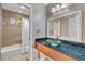 Bathroom with granite vanity and glass sink at 610 Renner Rd, Port Orange, FL 32127