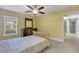 Bedroom with dresser and access to hallway at 610 Renner Rd, Port Orange, FL 32127