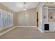 Spacious dining area with large windows and tile floors at 610 Renner Rd, Port Orange, FL 32127